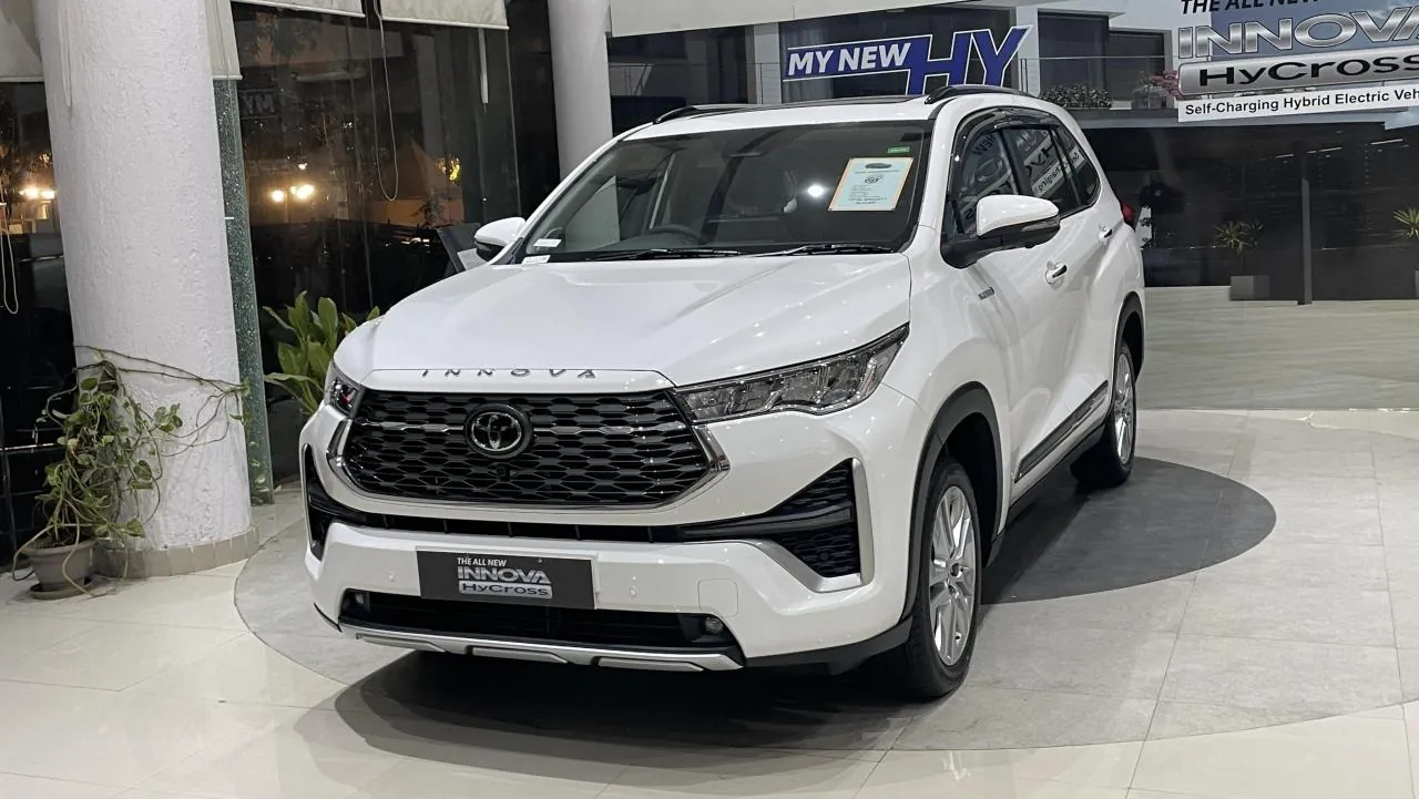 White Innova Hycross front-angle view with LED headlamps
